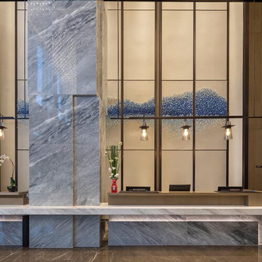 Фото New Century Hotel Zhenhai