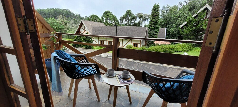 Фото Dúplex Luxo com Piscina Aquecida, Lareira e Wifi