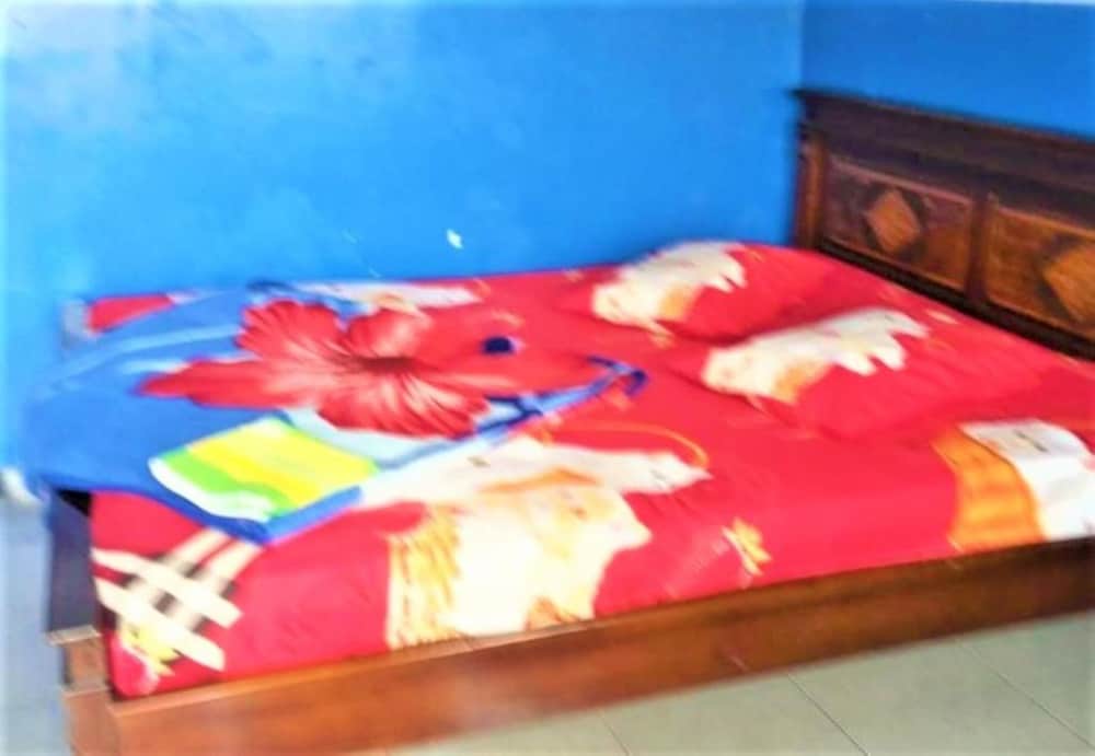 Фото Penginapan Rezeki