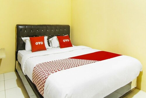 Гостиница Oyo 90900 Pagi Sore Residence в Паданге