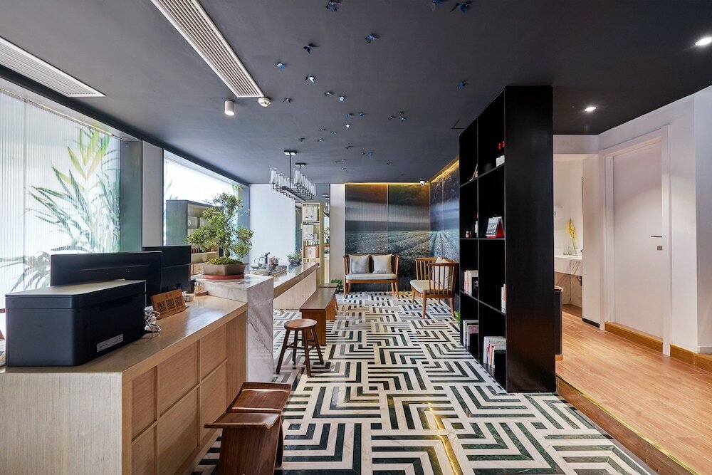 Фото Wuhua Xingxiang Shanfang Hotel