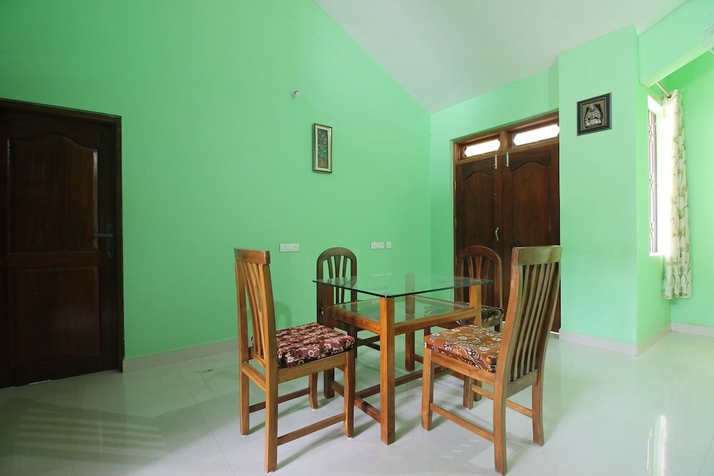 Фото Oyo 39345 Chrisander's Resort