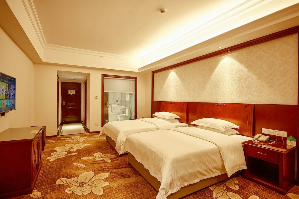 Фото Xinghui Hotel Guangzhou