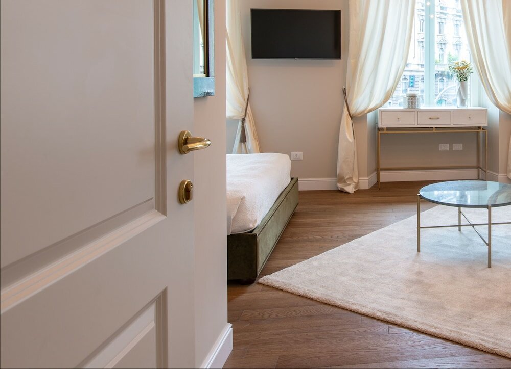 Фото Daplace - Corso Monforte Suites