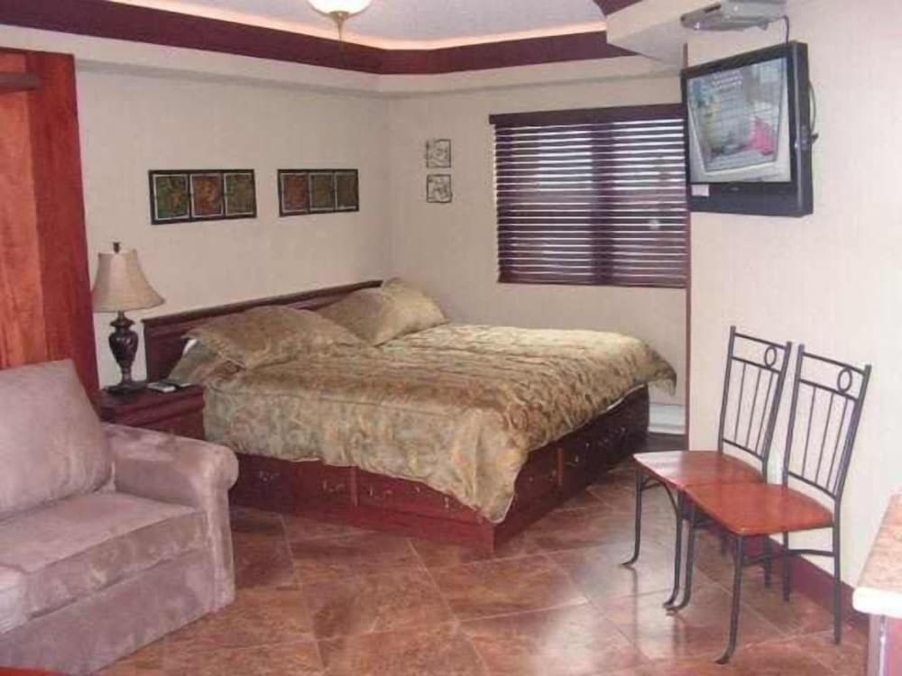 Фото Sifting Sands Motel