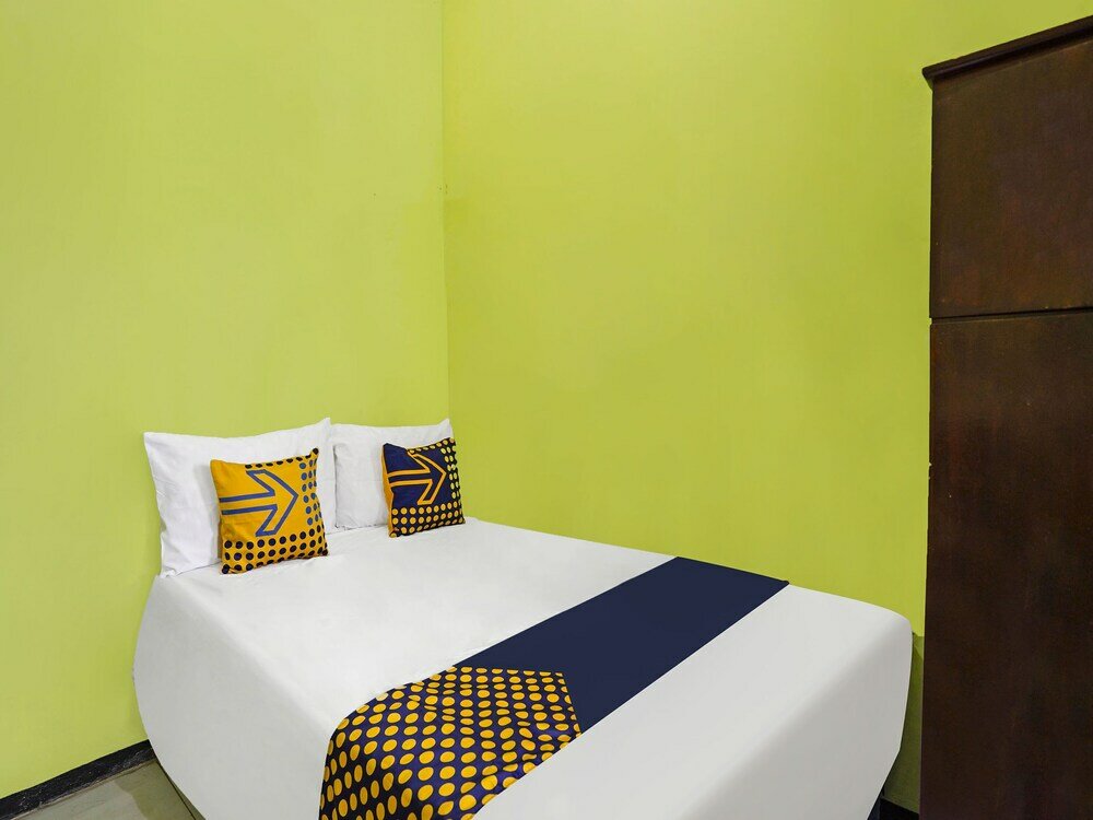 Фото Spot On 91869 Insan Mulia Kost Syariah