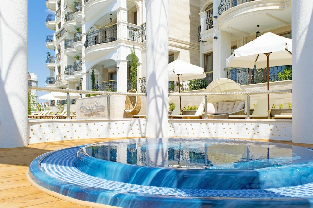 Фото Harmony Suites Saint Vlas