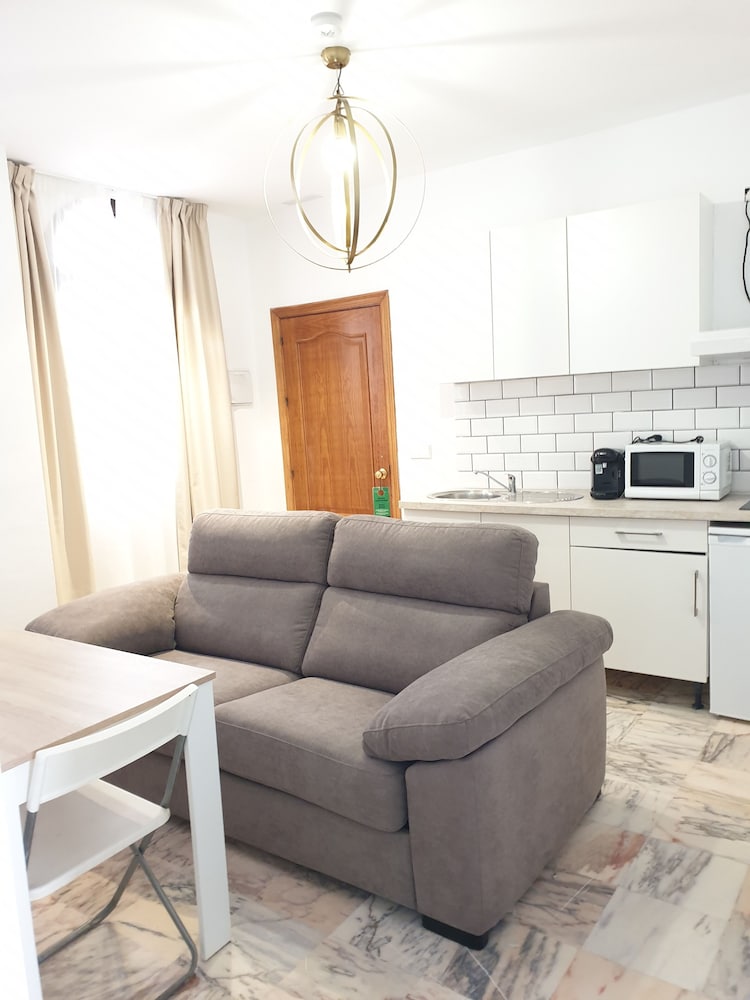 Фото Hotel y Apartamentos Doña Lola