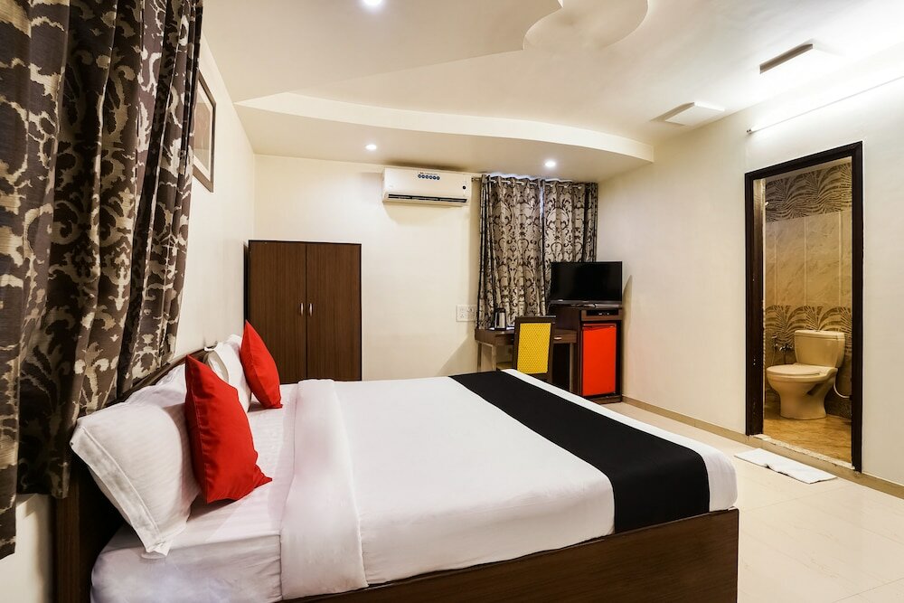 Фото Capital O 48482 Hotel Tribecca Inn