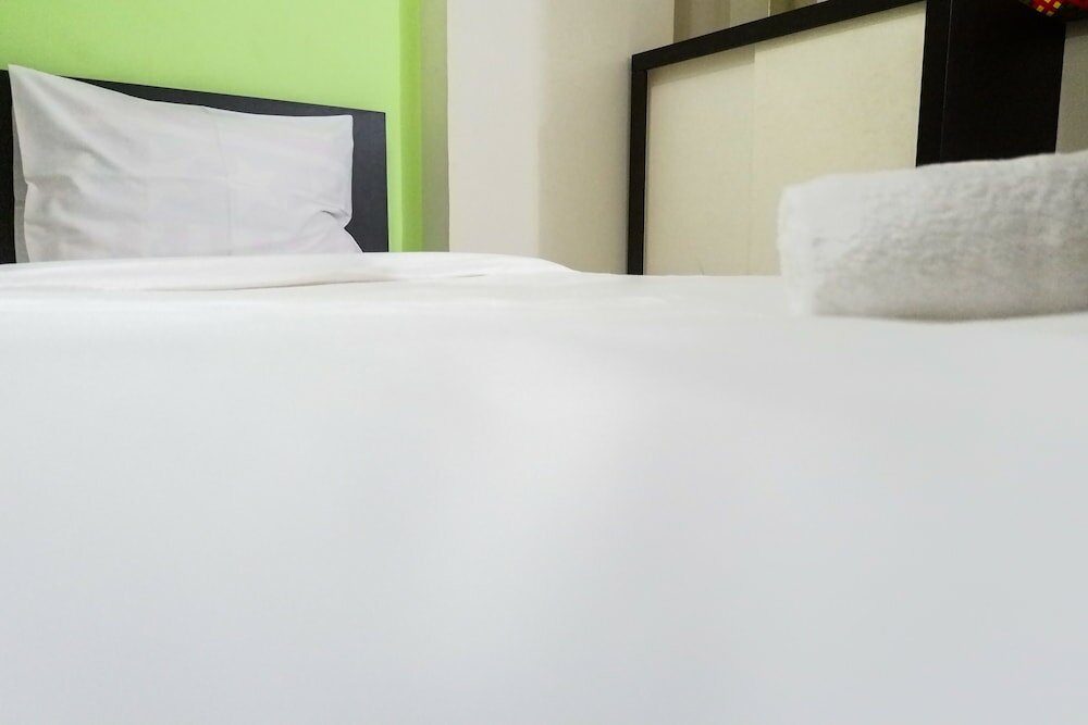 Фото Minimalist 2br at Dian Regency by Travelio