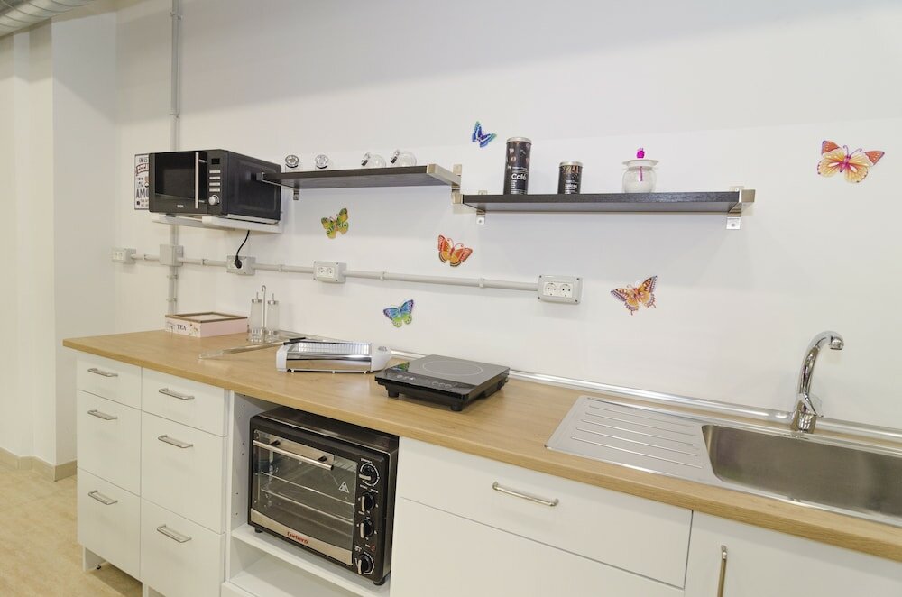 Фото La Fabrica Urban Hostel