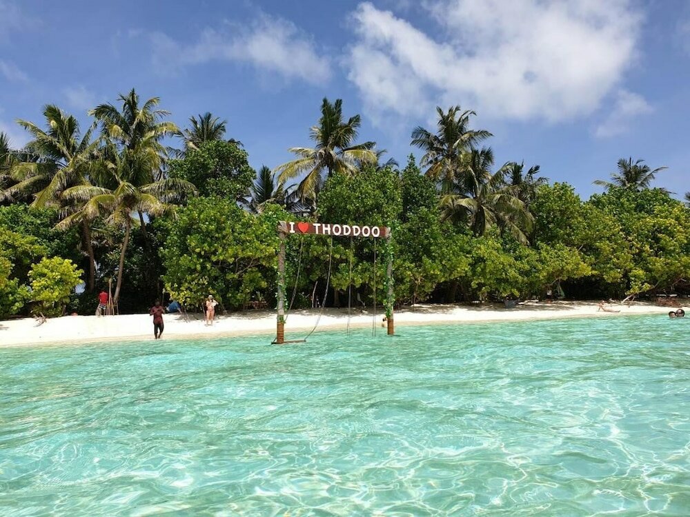 Фото Thoddoo Beach Holiday Inn