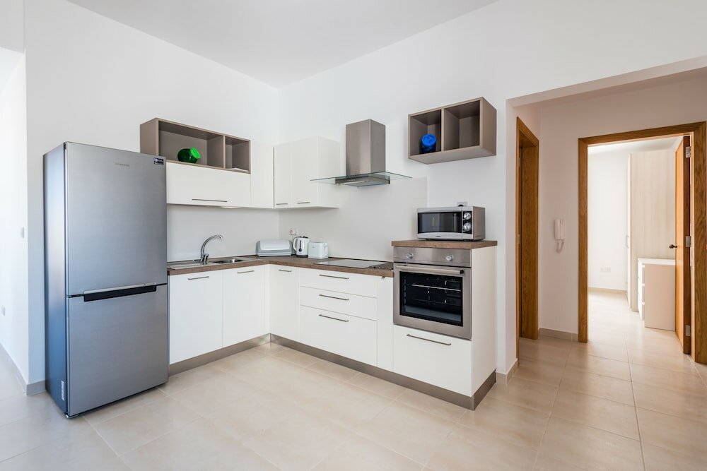 Фото Yellow Pearl Apartments