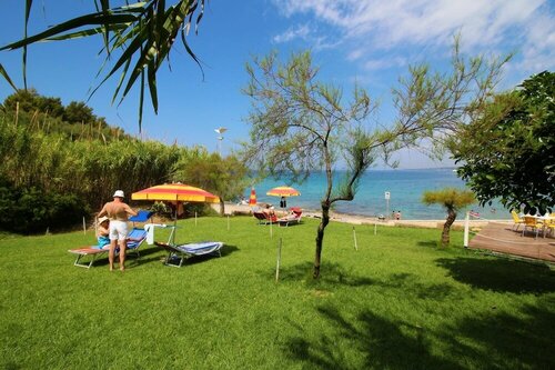 Гостиница Luci Front Beach House