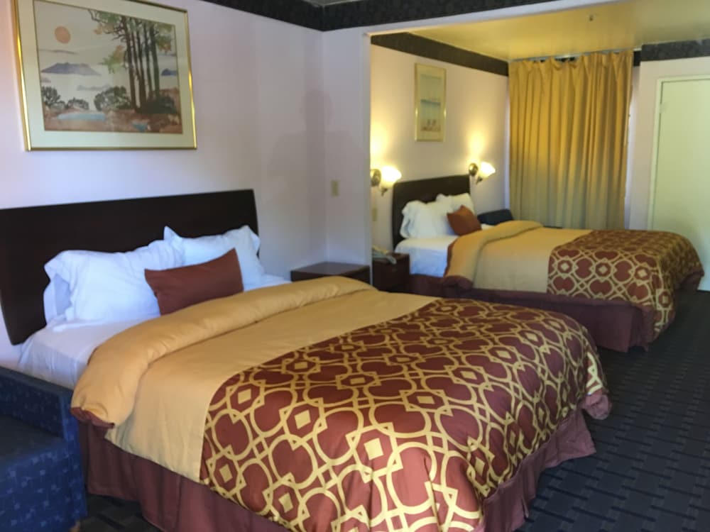 Фото Executive Suites Inn