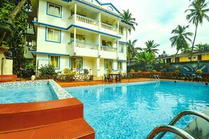 Гостиница Fabhotel Grand Royal Palms в Бенаулиме