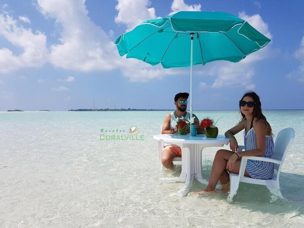 Фото Rasdhoo Coralville Hotel