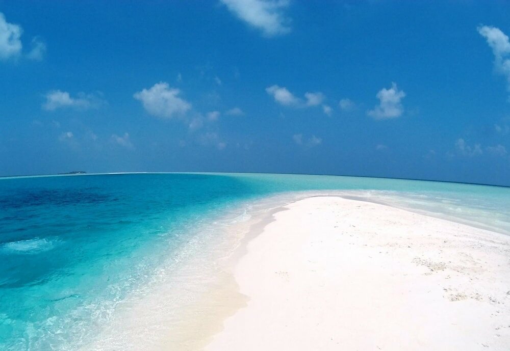 Фото Rasdhoo Coralville Hotel