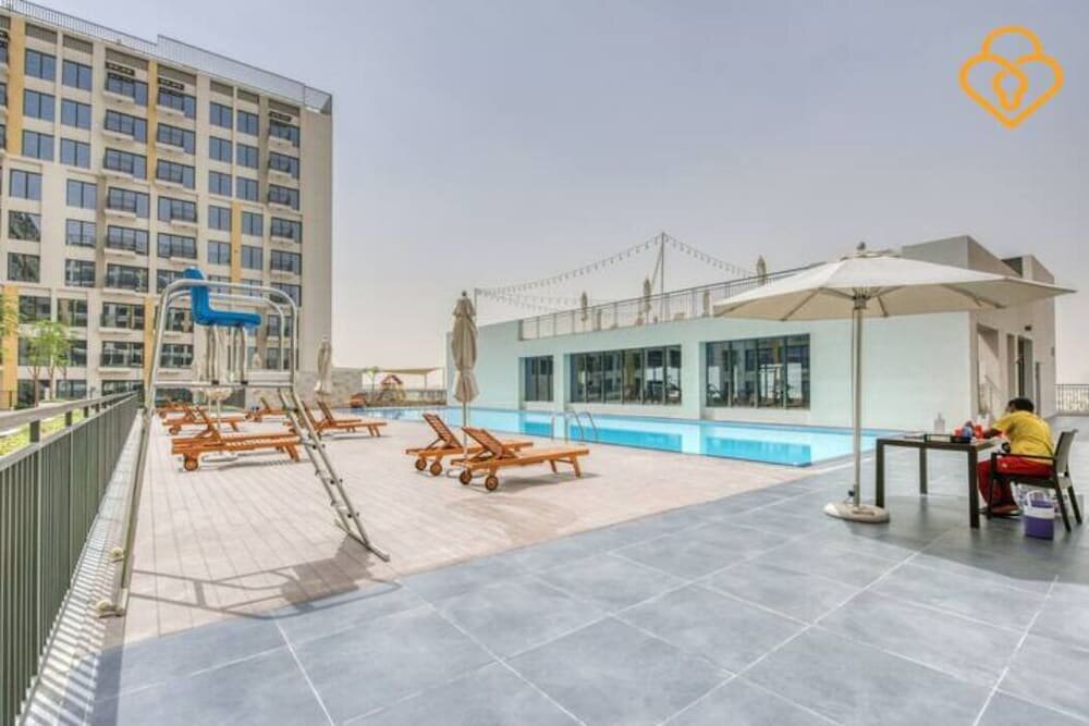 Short-term housing rental Una Modern Studio Town Square, Emirate of Dubai, photo