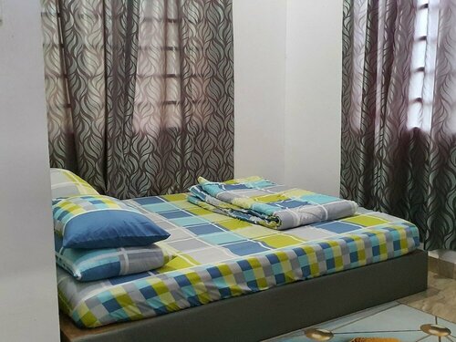 Гостиница Oyo Home 90496 Delima Homestay в Алор-Сетаре