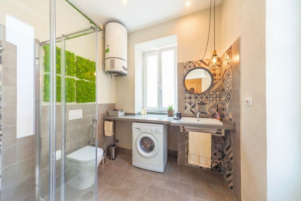 Фото Charm Of Ortigia Central Flat