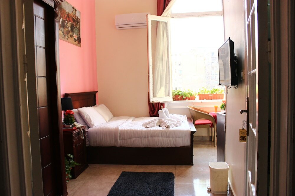 Фото Victory Of Downtown Hotel