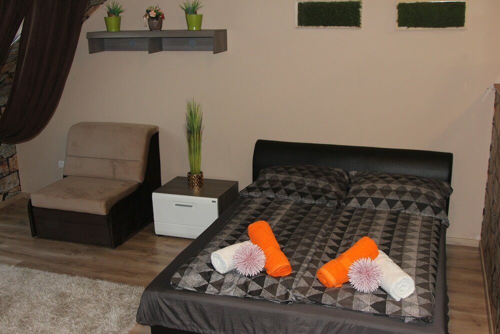 Фото Gold Downtown Apartman