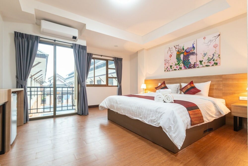 Фото Peacock De Pai Hotel