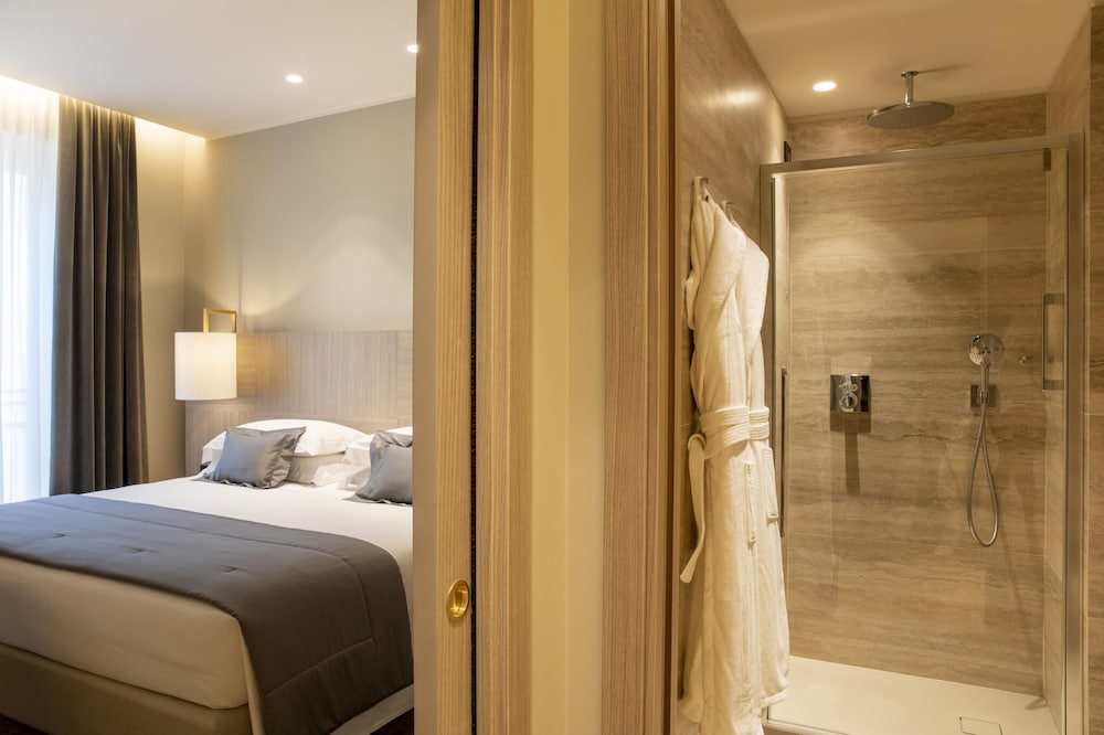 Фото Starhotels Duomo Grand Apartment - 2 Bedrooms