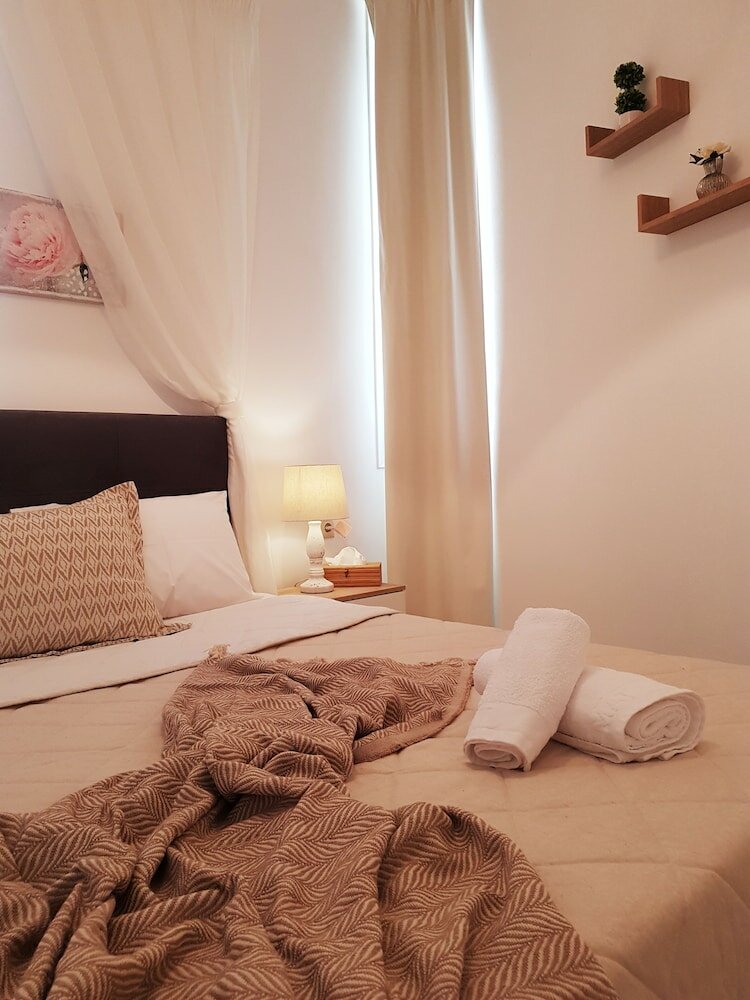 Фото Emmanouil Airport Beach Apartment