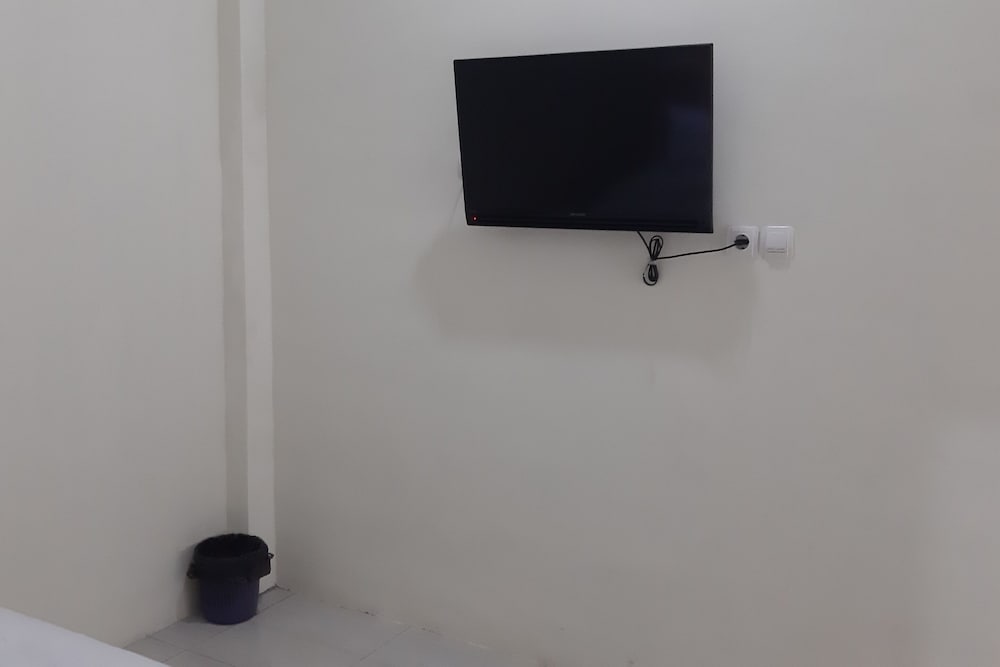 Фото Oyo 90299 Corner Guest House