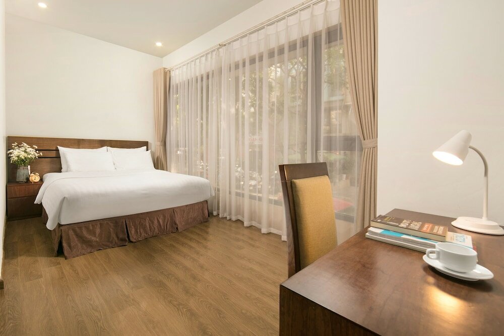 Фото Poonsa Duy Tan Hotel & Serviced Apartment