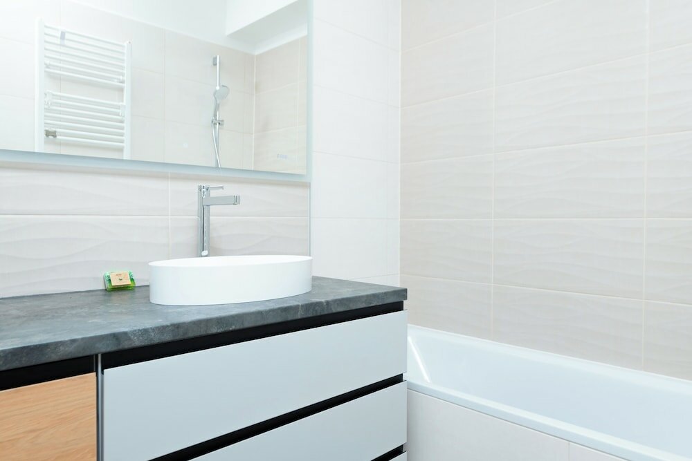 Фото WaterFront City Apartments by UrbanRent