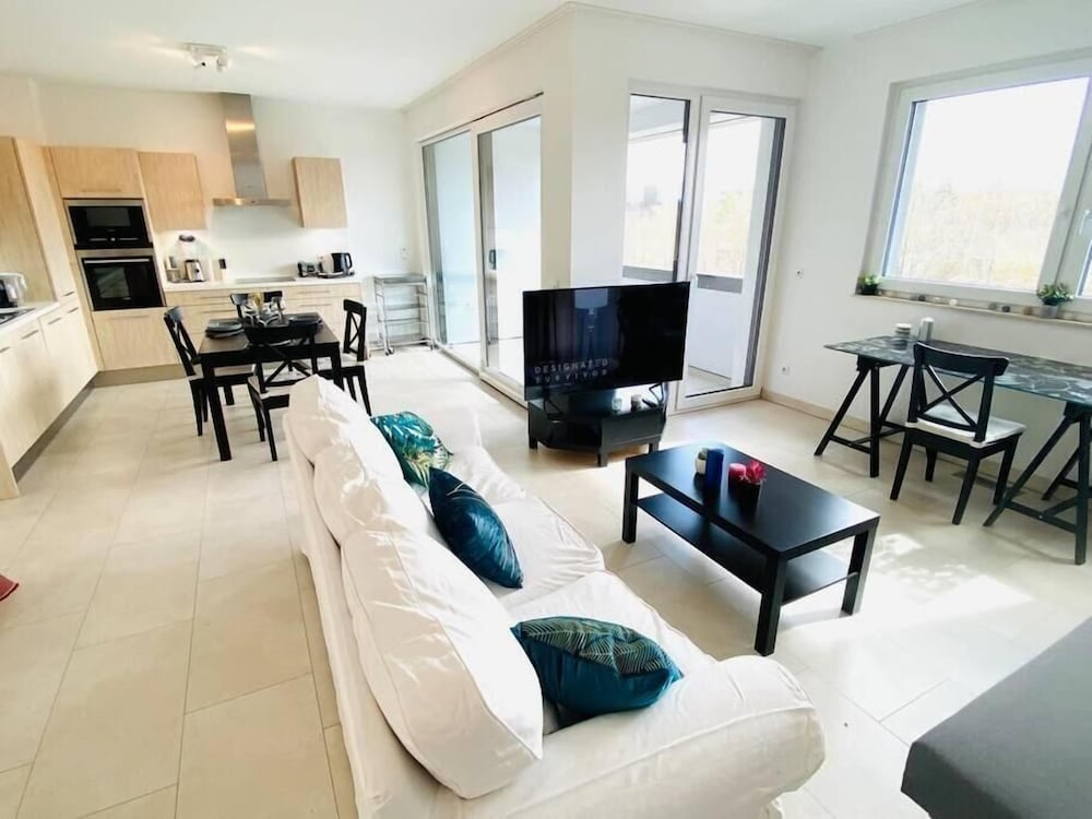 Фото Spac. Flat -Kirchberg w Parking&Terrace