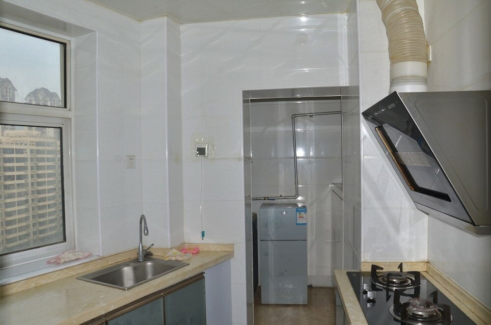 Фото Lanzhou Longshang Mingzhu Apartment Two-bedroom suite