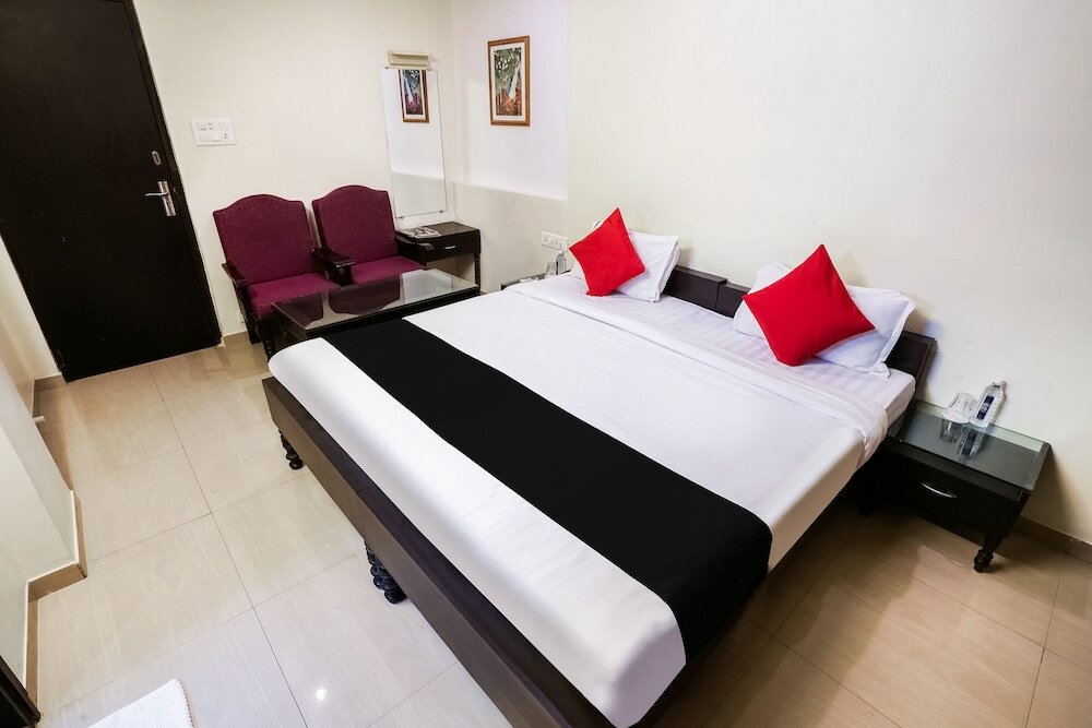 Фото Capital O 48482 Hotel Tribecca Inn