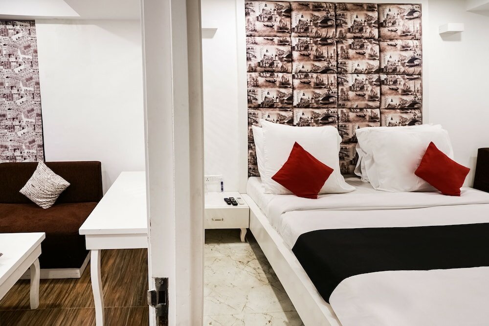 Фото Capital O 48482 Hotel Tribecca Inn