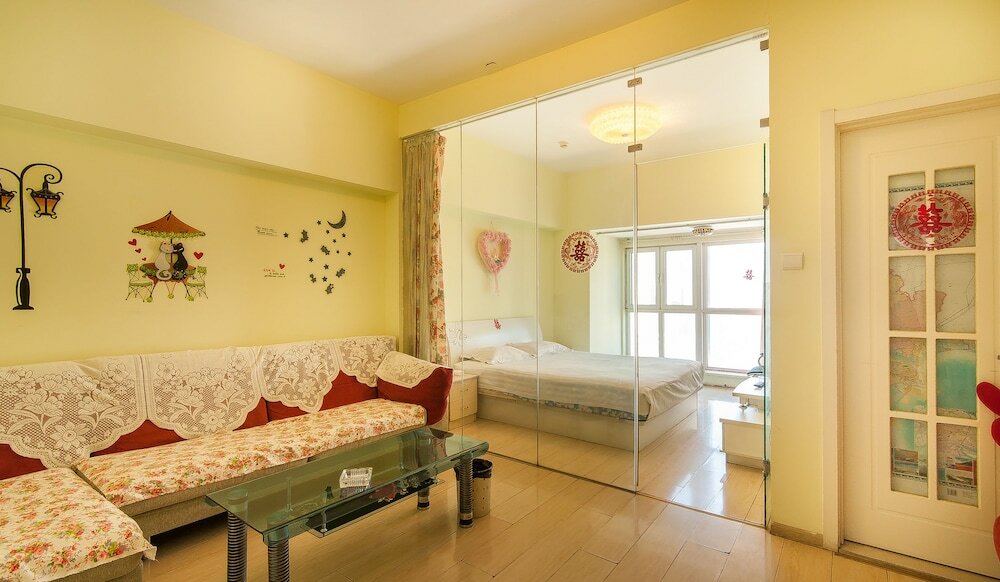 Фото Tianjin Xinyi Apartment Hotel