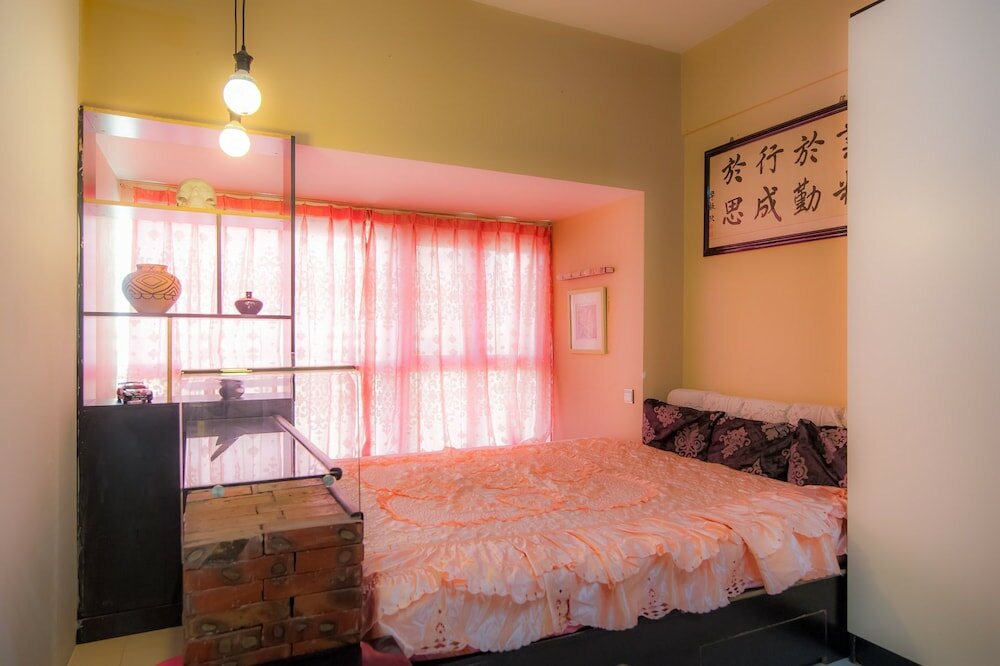 Фото Tianjin Xinyi Apartment Hotel