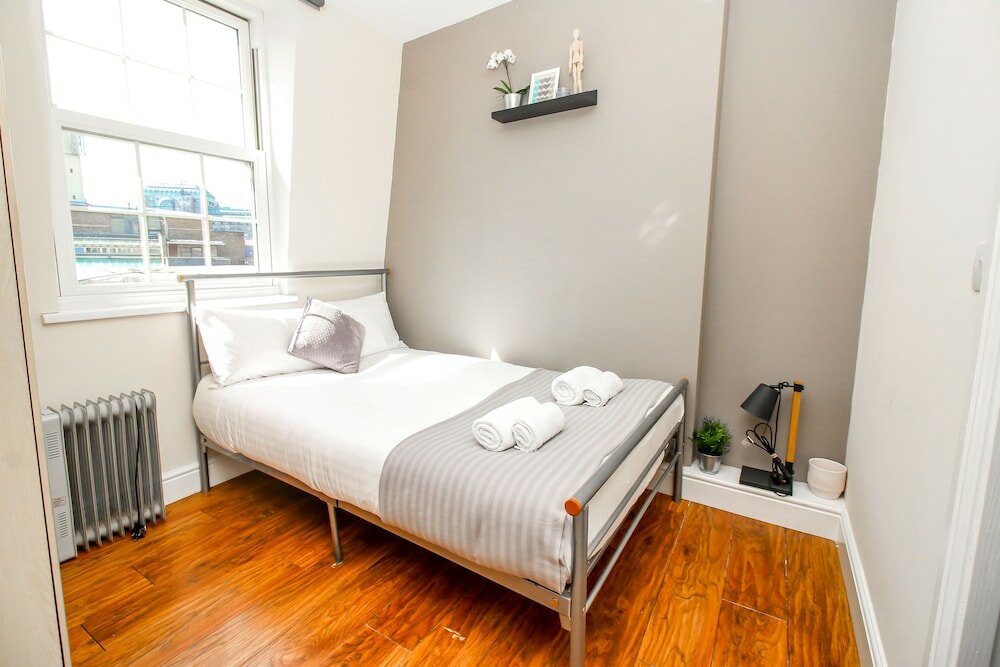 Фото City view flat at Liverpool st Brick Ln