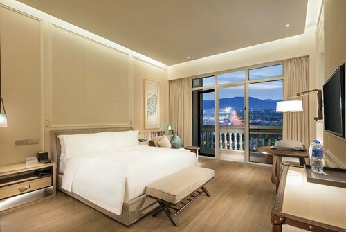 Гостиница Hilton Dalian Golden Pebble Beach Resort