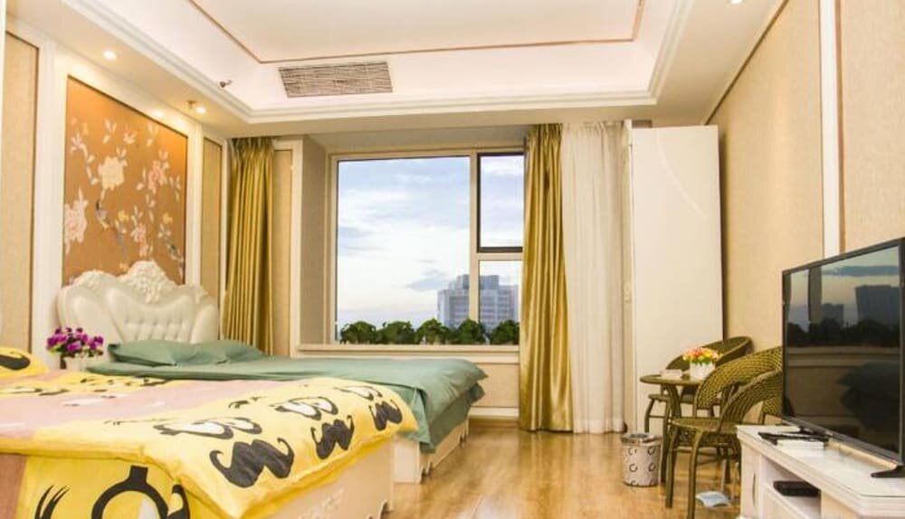 Hotel Guotai Ganghui Huiting Apartment, Dalian, photo