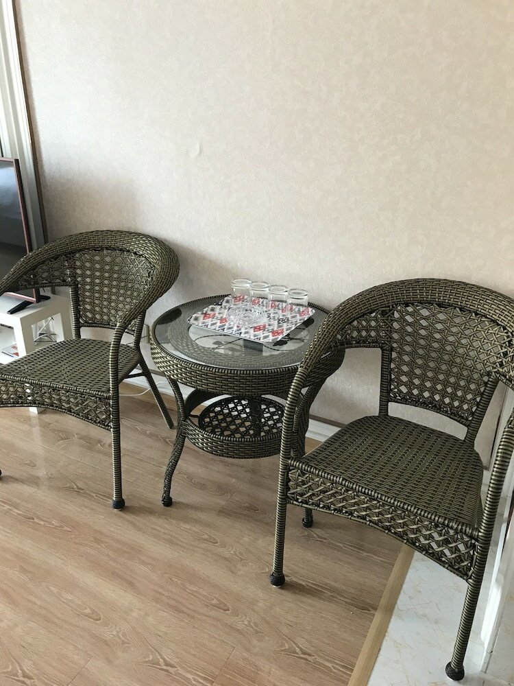 Фото Dalian Xuanya Apartment