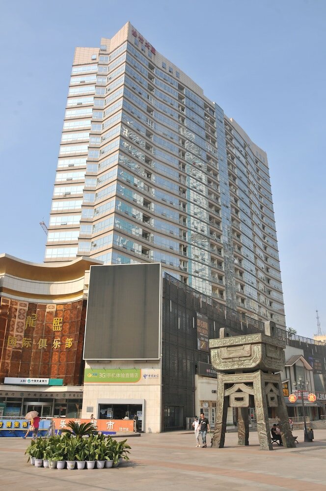 Фото Dalian Xiuzhu Building Apartment