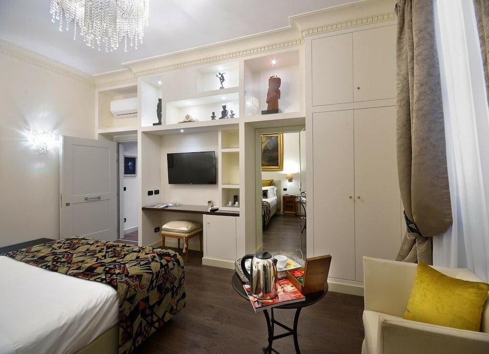 Фото Tridente Suites