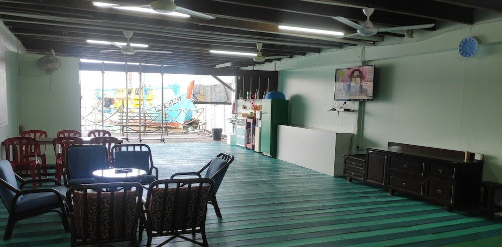 Фото Pangkor Fishing Village Guest House