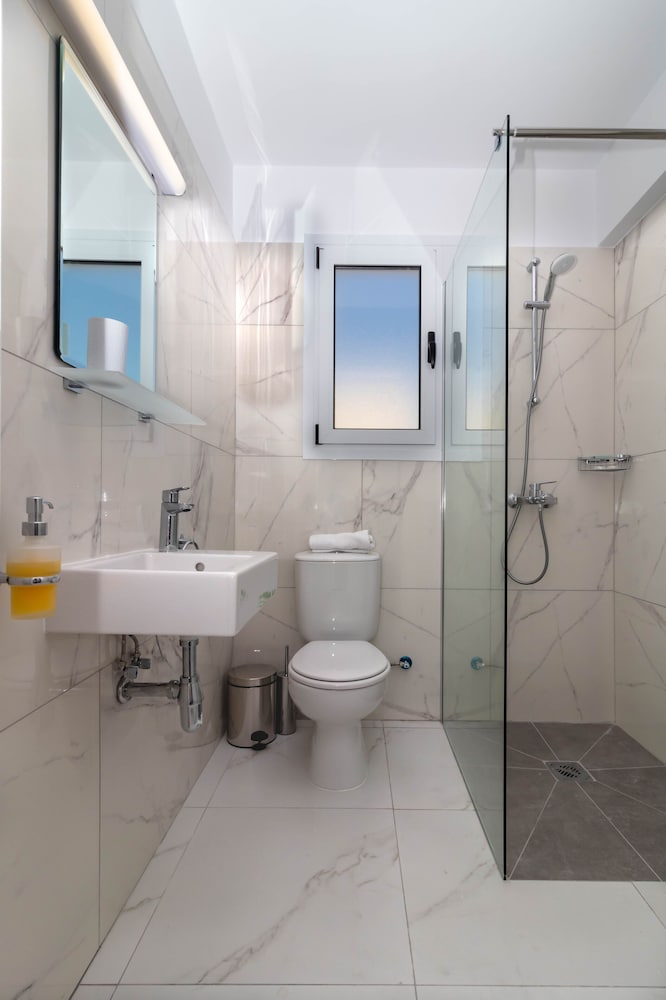 Фото Rododafni Beach Apartments