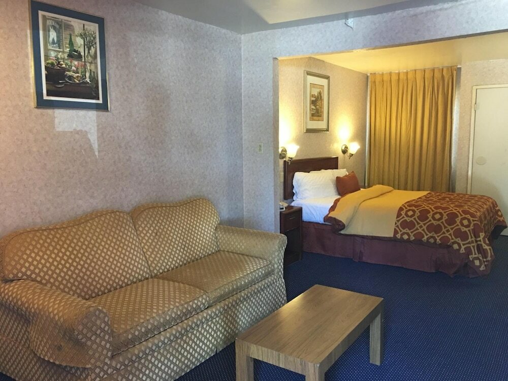 Фото Executive Suites Inn