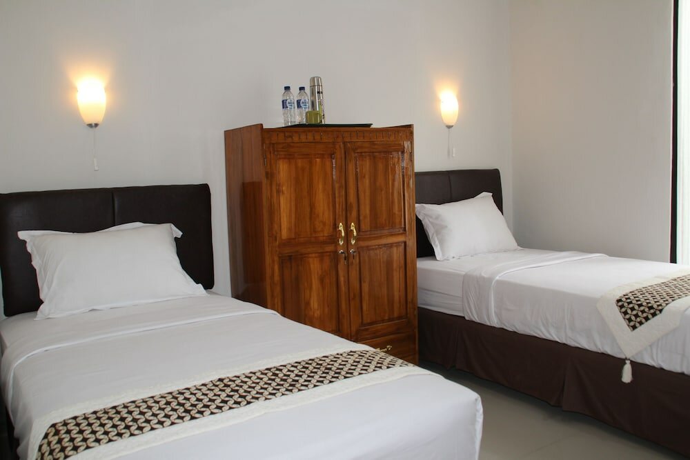 Фото Natura Rumah Singgah Guest House