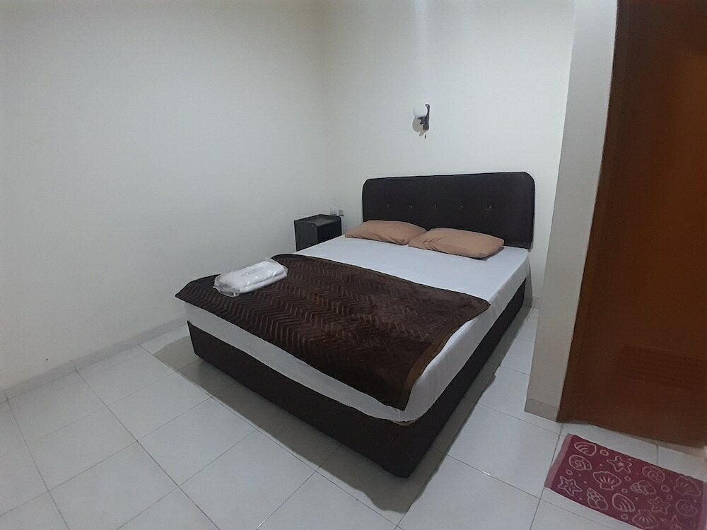 Фото Aj Bike Guesthouse Syariah